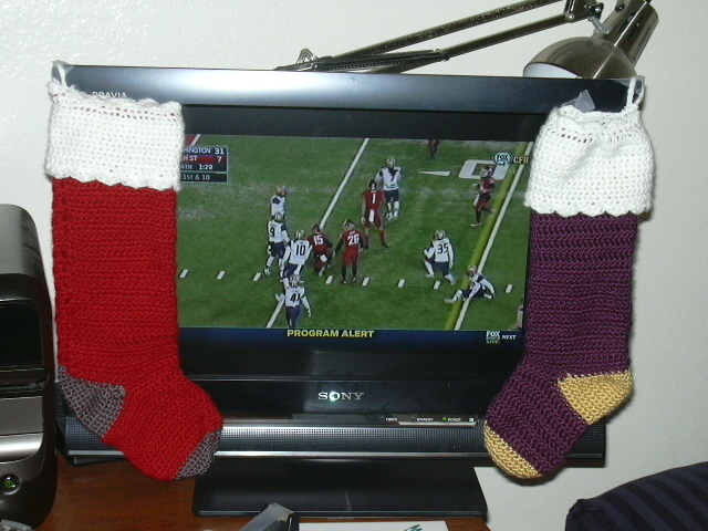 The stockings were hung by the TV with care, in hopes that an Apple Cup win would be there.