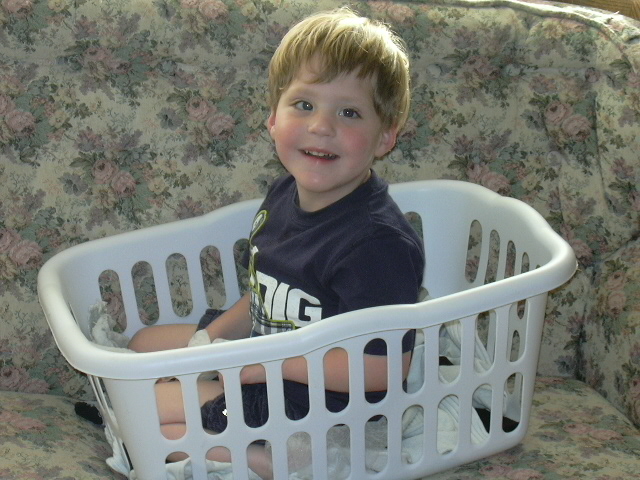 Daniel helping with laundry