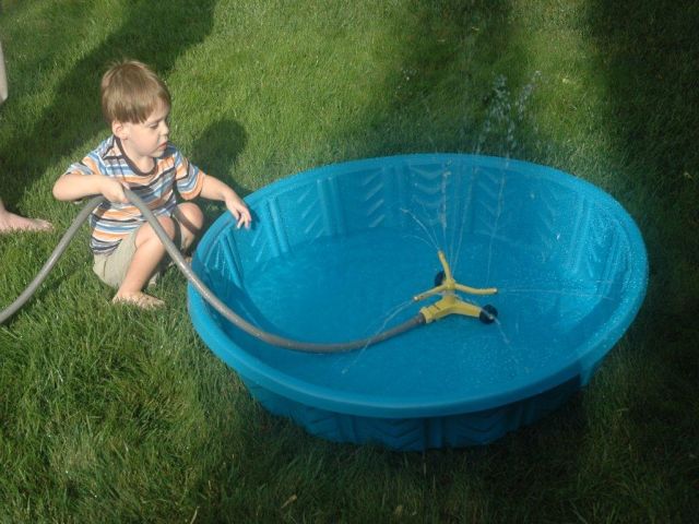Investigating his wading pool.