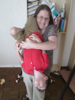 Jen with Daniel upside down